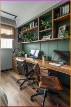 an office with green walls and wooden flooring is pictured in this image, there are two desks on either side of the room