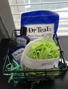 a basket filled with lots of green items