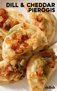 some food is on a white plate with the words dill and cheddar pierogis