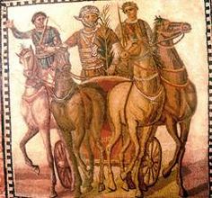 a painting on the side of a building with horses and men riding in chariots