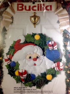 a santa clause ornament hanging on a door