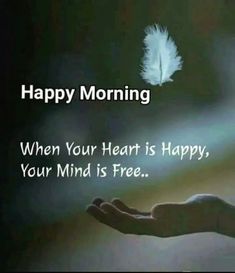 a hand holding a white feather with the words happy morning