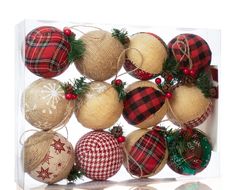 an assortment of plaid christmas ornaments in a clear box on a white background with reflection