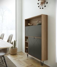 a dining room with a clock on the wall