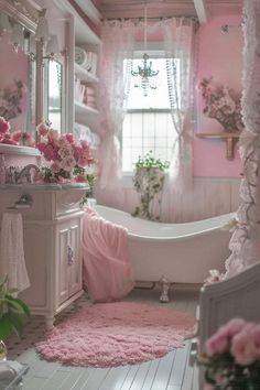 a bathroom with pink walls and flooring is decorated in shabby chic style