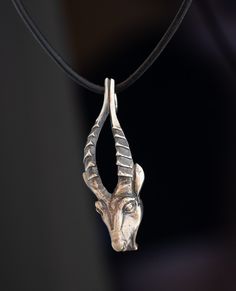 A Capricorn always takes their own destiny by its horns. Handcrafted in stunning detail, this solid 14K gold Capricorn pendant will help you along the way.  The constellation of Capricorn represents the Sea-Goat, whose mythology extends back to the middle of the Bronze Age. The Babylonians called the Sea-Goat Ea, who was the protective god of water, knowledge, and creation. Capricorn season begins on December 21, commencing the Winter Solstice in the Northern Hemisphere. Capricorns are born between December 21 and January 20, and belong to the Earth element of the zodiac. They are all practical, self reliant, stoic and ambitious. CHARM DIMENSIONS: 1 3/4 inch high x 5/8 inch wide (42 mm X 14.25 mm) This charm is solid (not plated) 14K gold, stamped for authenticity, and made in NYC. The gol God Of Water, Goat Jewelry, Capricorn Pendant, Sea Goat, Capricorn Season, Sculptural Jewelry, Zodiac Sign Necklace, New York Studio, Sign Necklace