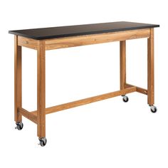 a wooden table on wheels with a black top