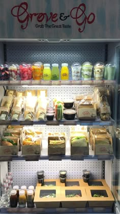 a display case in a store filled with lots of different foods and condiments