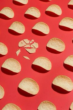 crackers are arranged on a red surface