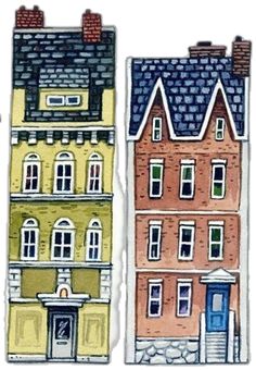 two buildings with windows and doors are painted in watercolor on white paper, each building has a blue door