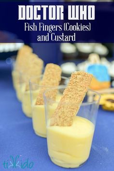 three small cups filled with food on top of a blue table