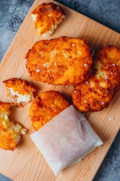 some food is laying out on a cutting board and ready to be eaten by someone