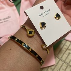 Kate Spade Two Bangles And Matching Earrings In Gold Tone And Black Spade They Are Like New. I Only Wore The Bangles Once And Earrings Are New With Tag Attached Let Me Know Any Questions Will Come With Dust Bag And Shopping Bag Black Spades, Kate Spade Bracelet, The Bangles, Earrings In Gold, Spade Jewelry, Kate Spade Jewelry, Kate Spade New York, Matching Earrings, Gold Black