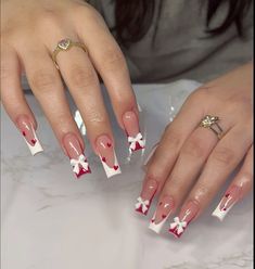 #rednails #valentinesnails #bows #bownails #hearts #whitenails #acrylicnaildesigns #aesthetic #coquette #cute #pinkaesthetic #redaesthetic #nails #nailsofinstagram Flower Heart Nails, Bow Design On Nails, Bow Nail Ideas, Red Nails With Hearts, Cute Nails For Christmas, Acrylic Nails With Bows, Cute Bow Nails, Red Coquette Nails, Red Nails With Bow