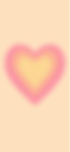 a pink and yellow heart on a beige background