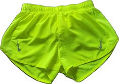 Nike Yellow Sport Bottoms, Neon Yellow Sports Shorts, Nike Yellow Summer Bottoms, Nike Yellow Bottoms For Summer, Nike Stretch Yellow Bottoms, Nike Yellow Shorts, Stretch Yellow Nike Bottoms, Yellow Stretch Nike Bottoms, Nike Yellow