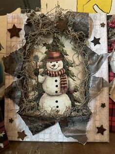 a christmas card with a snowman on it