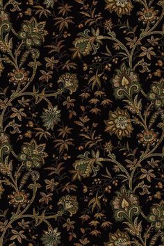 a black background with gold and green floral designs on the bottom half of it,