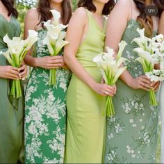 the bridesmaids are all wearing green dresses