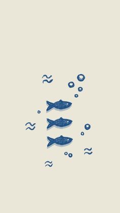 three fish swimming in the water with bubbles