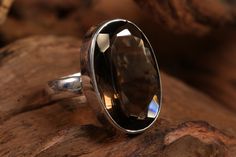 Smokey Quartz Ring Size 7 Approx. Dimensions: 0.8x0.5 inches Faceted smokey quartz ring set in sterling silver. Size 7. Quartz Ring, Smokey Quartz, Ring Sets, Ring Size, Sterling Silver, Silver