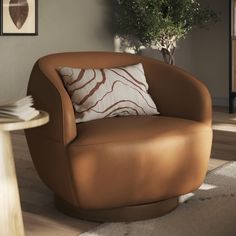 a brown chair with a pillow on top of it