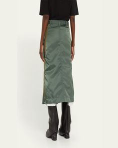 SACAI cargo midi skirt     High rise    Adjustable belt     Functional cargo pockets    Side zippers for adjustability     Hem falls below the knee    Skirt falls straight from hip to hem    Button/zip fly; belt loops    Polyester/nylon/polyamide/rayon/cellulose acetate    Dry clean    Made in Japan Cargo Midi Skirt, Below The Knee Skirt, Knee Skirt, Evening Flats, Cocktail Jacket, Knee Skirts, Cellulose Acetate, Fall Skirts, Jeans Jumpsuit