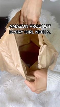 someone is opening a bag with the words amazon product every girl needs