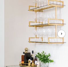 a marble counter topped with lots of wine glasses