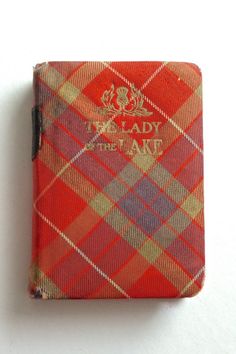 a red and yellow plaid book with the words lady jane on it