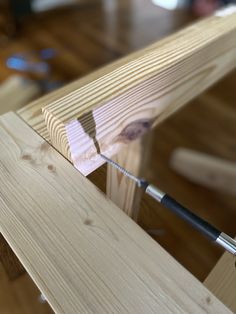 a piece of wood being worked on with a drill