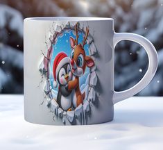 a white coffee mug with an image of a reindeer and penguin breaking through the wall