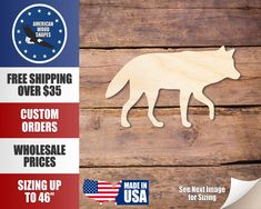 a wooden cutout of a wolf with the words free shipping over $ 35 on it