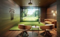 two chairs and a table in a room with green carpeted flooring on the walls