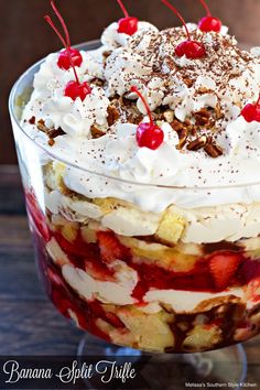 a trifle with bananas, strawberries and whipped cream