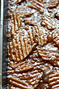 some kind of food that is sitting on a pan