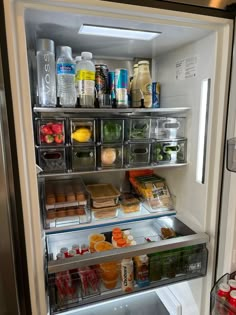 an open refrigerator filled with lots of food