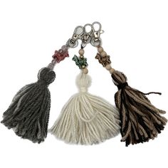 three tasseled key chains with beads and bows