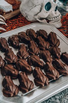 there are many chocolates on the tray ready to be eaten