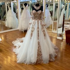 a wedding dress on display in a store