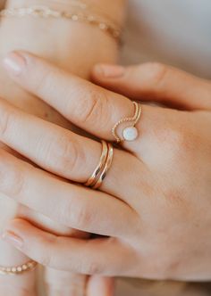 Originally designed to be paired with one of our Gemstone Rings, our Dune Ring stacks beautifully with any Stacking Bands and can hold it's own as a solo ring, too. Twisted wire is hand-shaped and made into a unique stacking ring. Available in 14kt Gold Fill + Sterling Silver. Handmade in Eau Claire, WI. Our jewelry is handmade so each piece will be unique and may vary slightly from what is pictured. Minimalist Adjustable Stackable Rings With Round Band, Adjustable Rose Gold Toe Ring Jewelry, Stackable Open Midi Rings For Promise, Adjustable Everyday Rings With Round Band, Adjustable Rose Gold Ring, Adjustable Round Band Rings For Everyday Wear, Everyday Adjustable Round Band Rings, Dainty Adjustable Stackable Rings, Adjustable Toe Ring Fine Jewelry