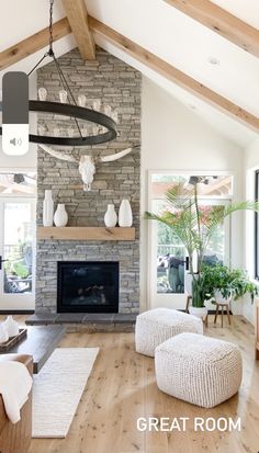 a living room filled with furniture and a fire place