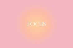 the word focus on a pink background