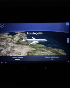 an airplane is shown on the screen in the dark