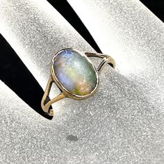 A Lovely Mid-Century 14k Yellow Gold Natural Opal Ring, It Has An Opal Cabochon Bezel Set Center, 10.3x 7.0mm. Spite Ring Shank, Size 6.5m Wight 1.7gm, No Hallmark, Tested 14k Jelly Opal, Natural Opal Ring, Ring Shank, Cabochon Ring, Opal Ring, Natural Opal, Opal Rings, Bezel Setting, Womens Jewelry Rings