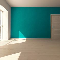 an empty room with blue walls and white flooring is shown in the foreground