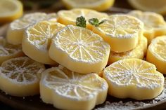 sliced lemons on a plate with powdered sugar