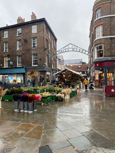 an open air market on a rainy day