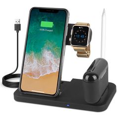 an iphone and charger are on display with the charging dock attached to it's base