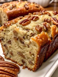 two slices of pecan bread on a white plate